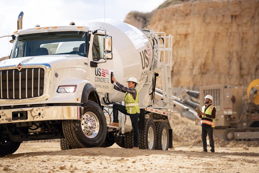 A person standing on a white truck