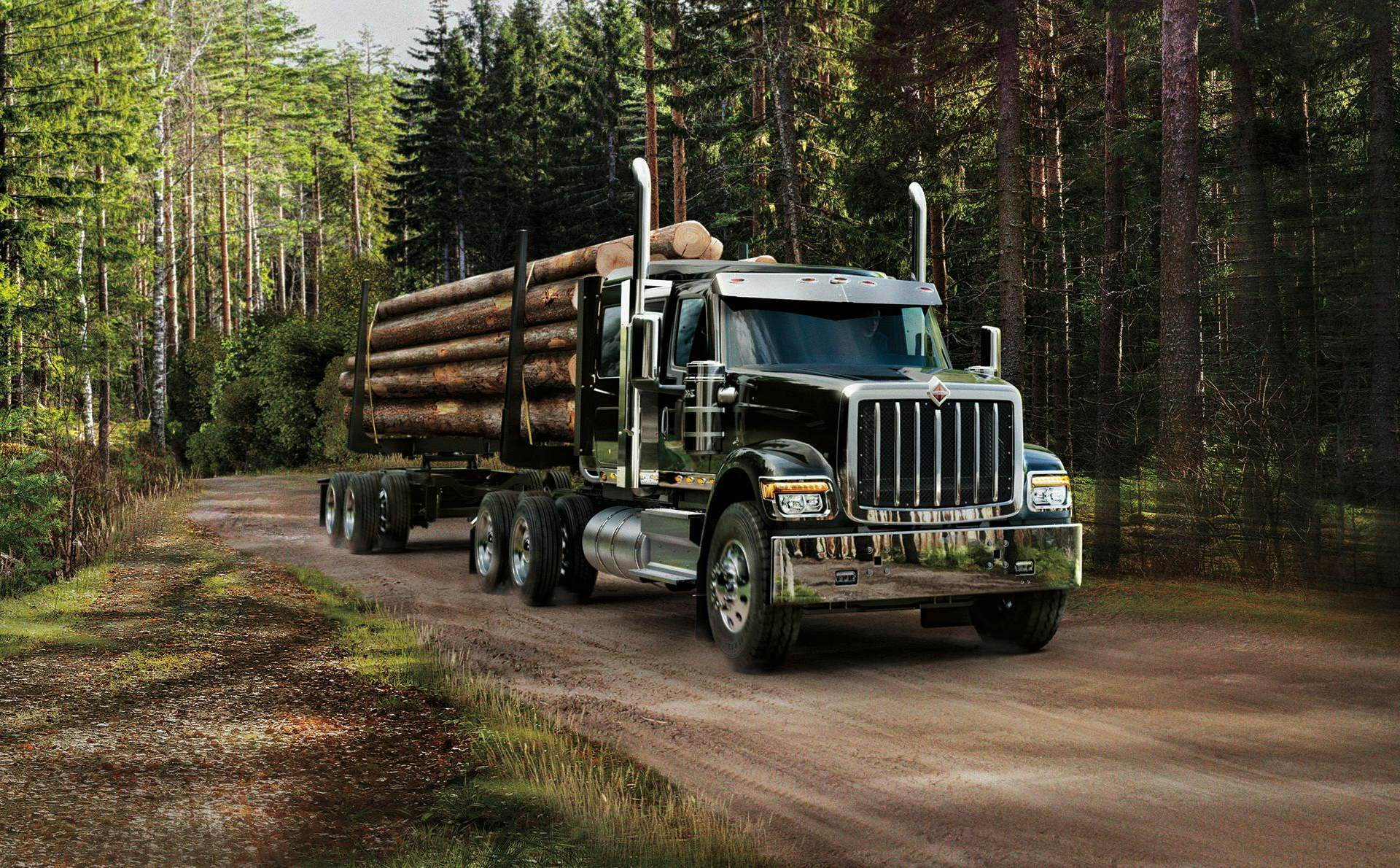 HX Series Logging Truck on Forest Road
