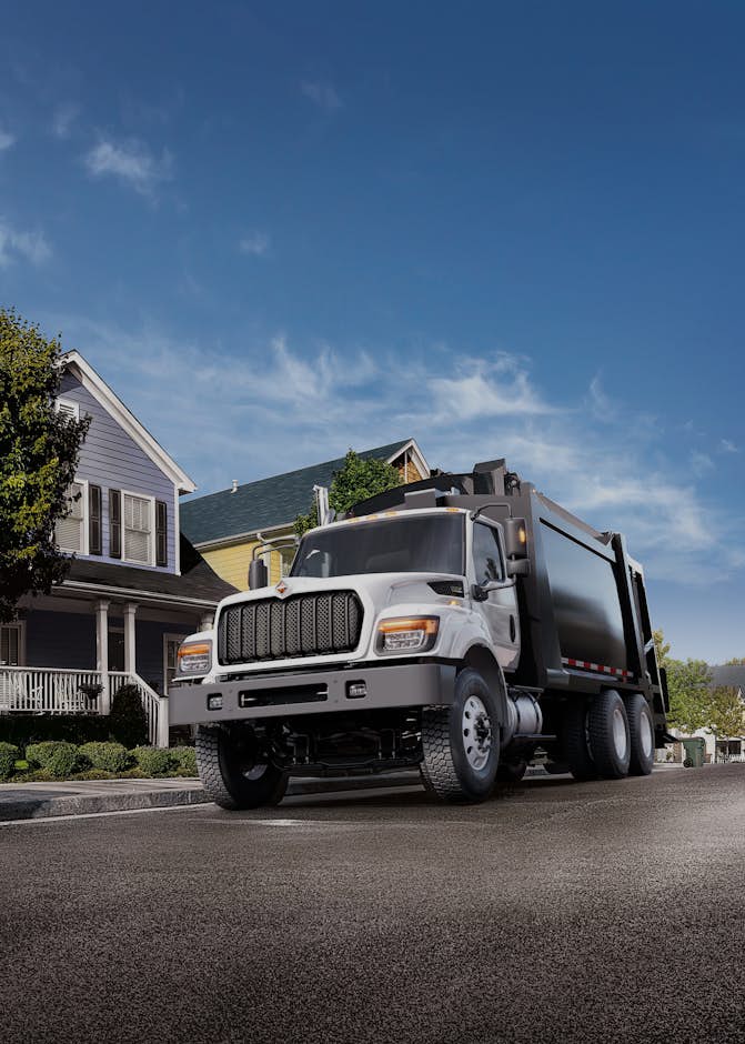 HV Series garbage truck in front of houses