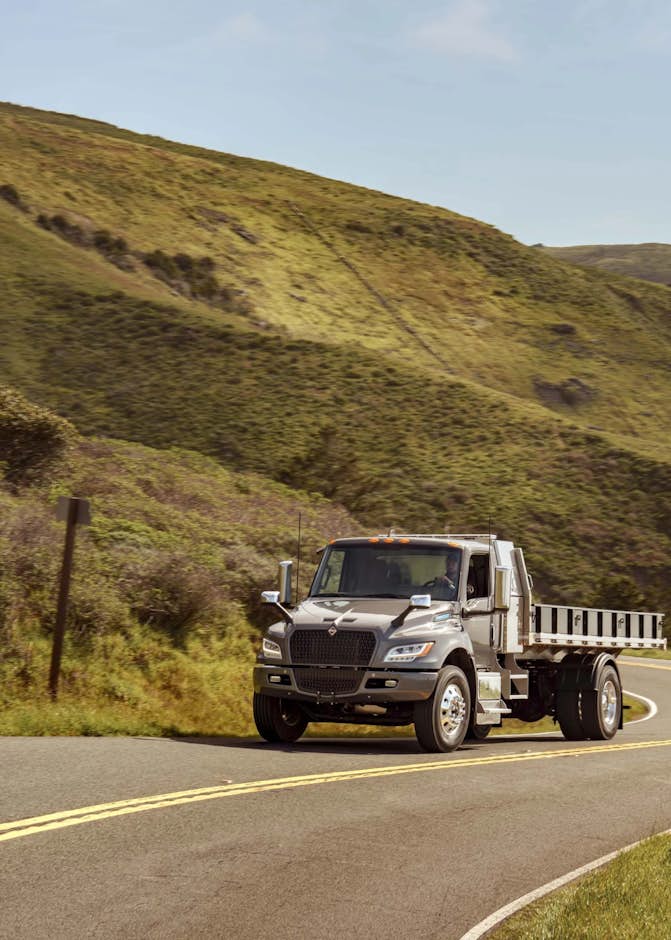 A truck driving on a winding road