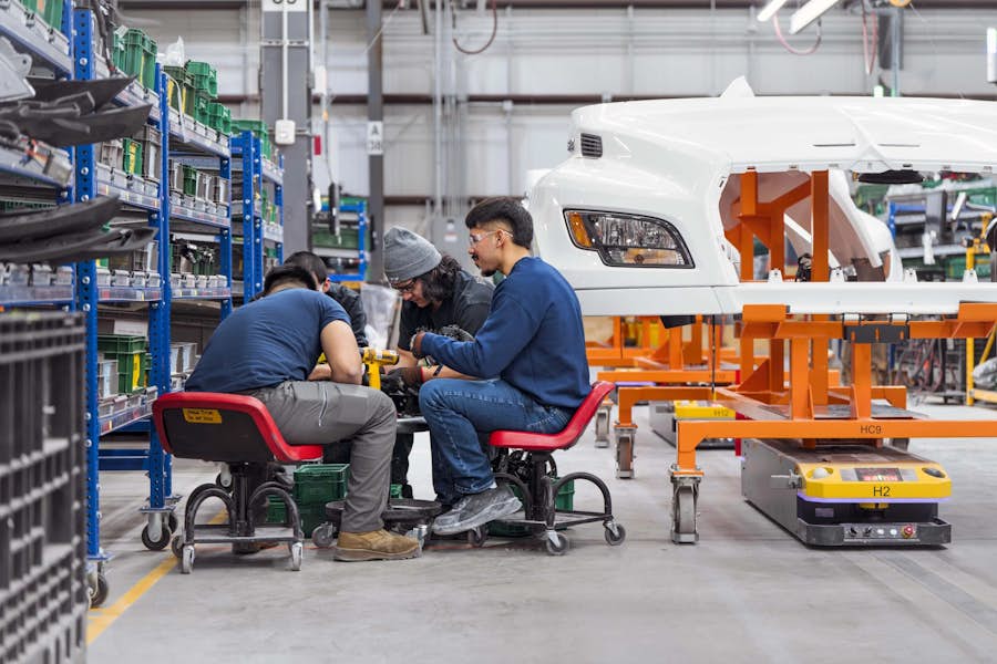 A group of men working in a factory
