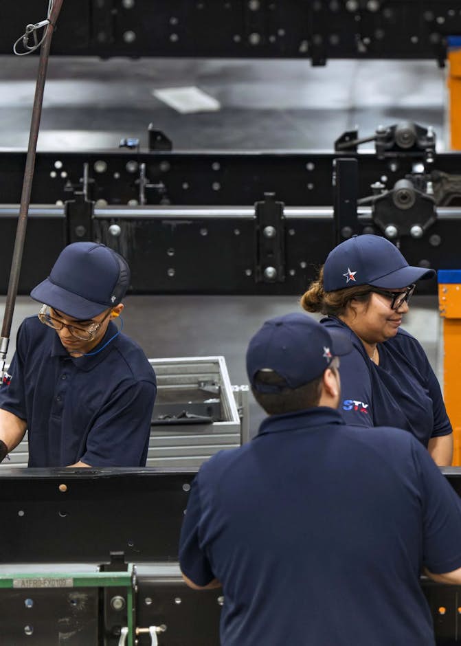 A group of people in blue uniforms