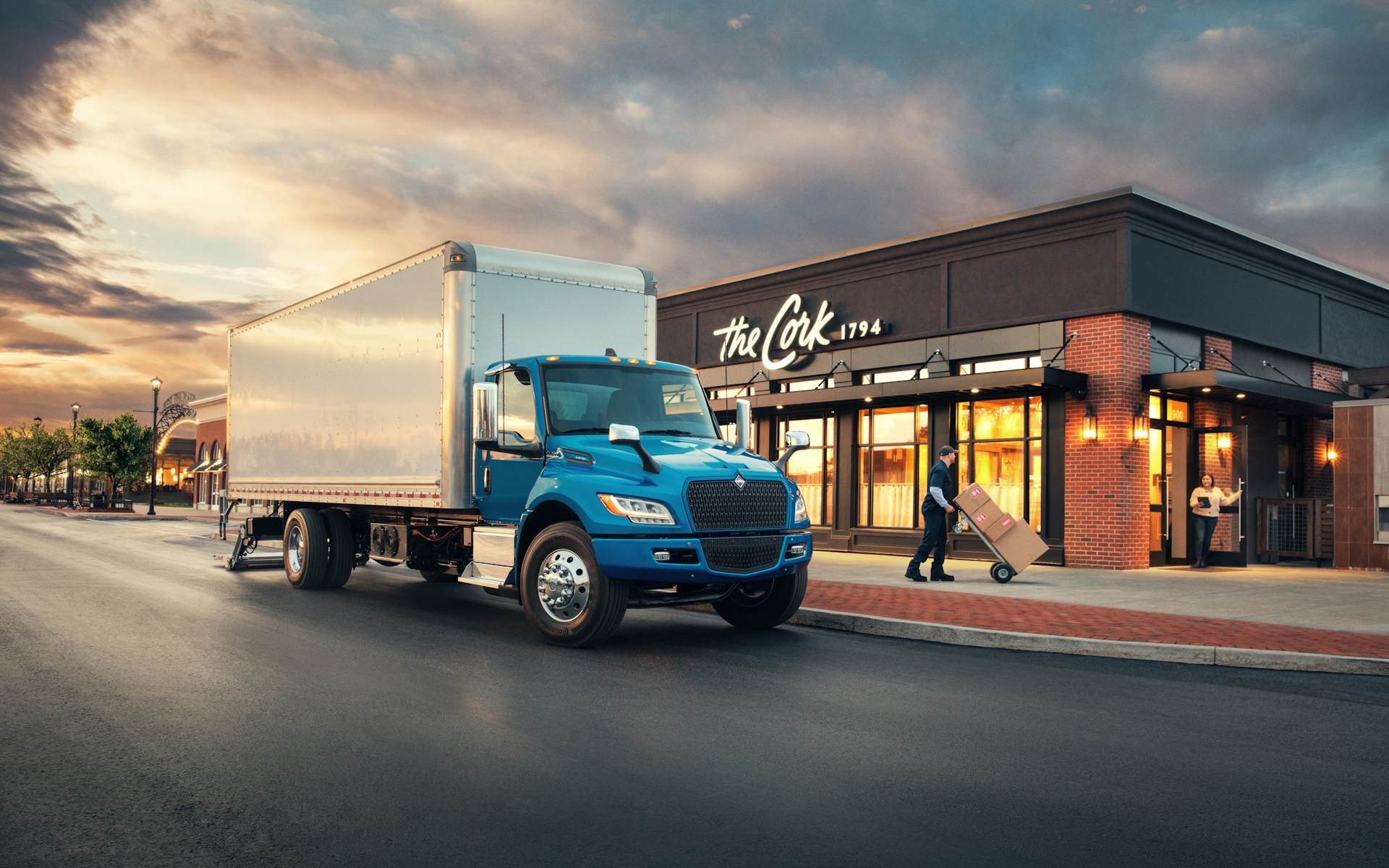 A blue truck on the street